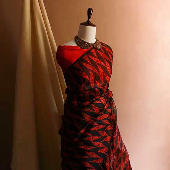 A pure red organza silk saree that deserves the utmost care from Uddup Silks, Chennai