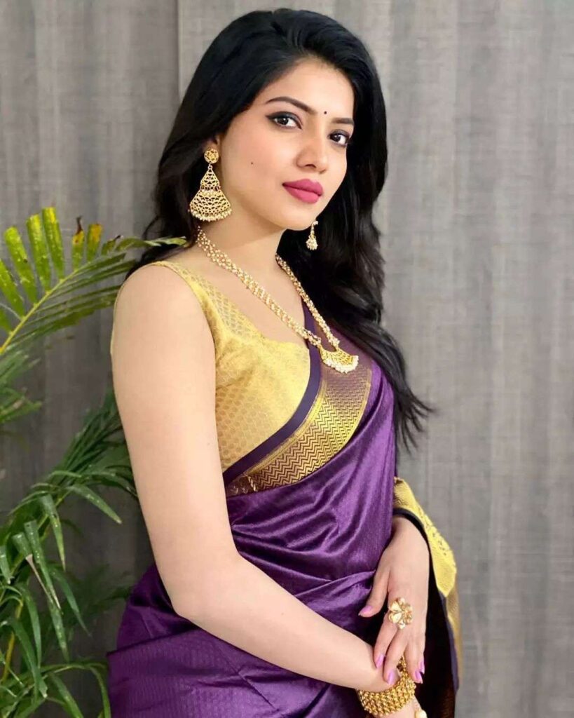 Purple Saree with Golden Blouse