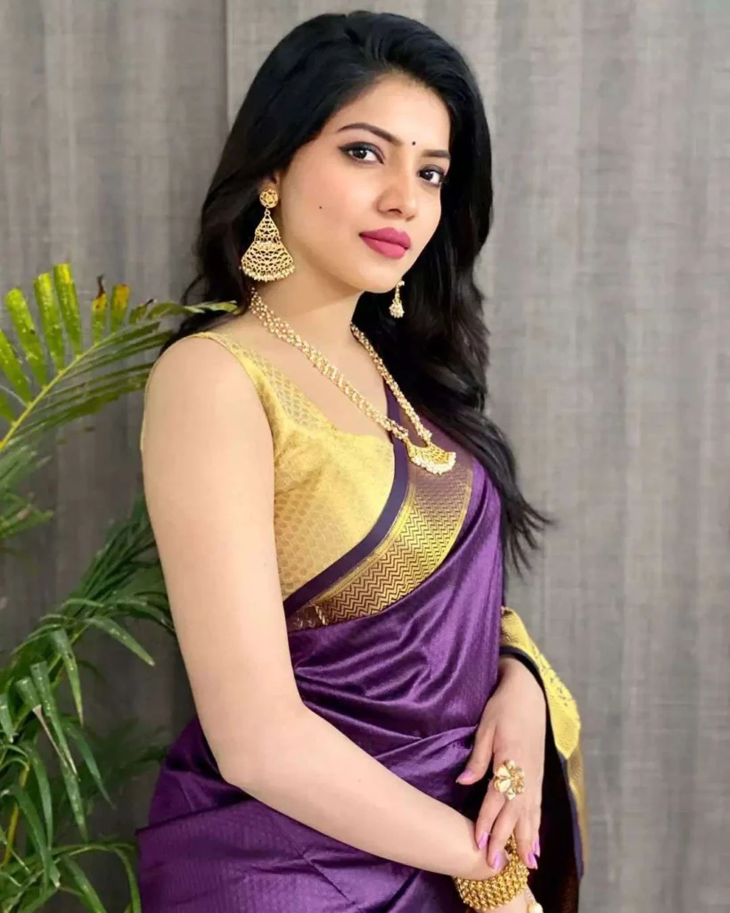 Purple Saree with Golden Blouse