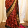 Autumn Elegance Orange and Black Printed Kanchipuram Silk Saree