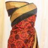 Autumn Elegance Orange and Black Printed Kanchipuram Silk Saree