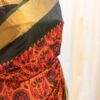 Autumn Elegance Orange and Black Printed Kanchipuram Silk Saree