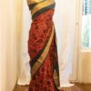 Autumn Elegance Orange and Black Printed Kanchipuram Silk Saree