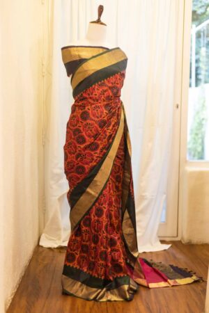 Autumn Elegance Orange and Black Printed Kanchipuram Silk Saree